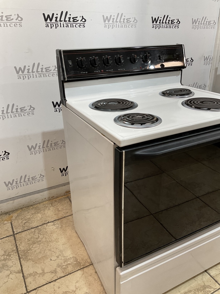 Magic Chef Used Electric Stove 220volts (40/50 AMP)  30inches (White/Black) 