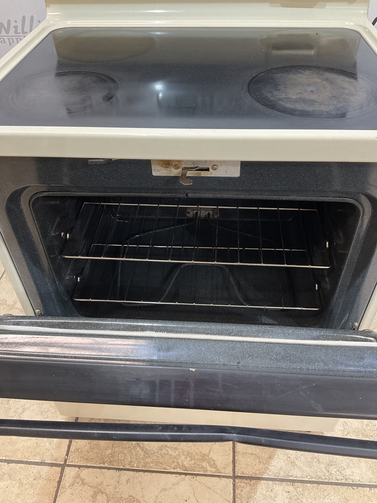Ge Used Electric Stove 220volts (40/50 AMP) 30inches {4 prong} (Bisque/Black) 