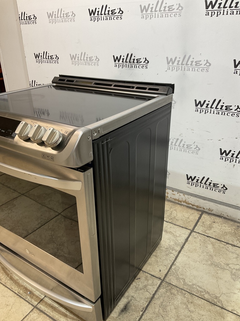 Lg Used Electric Stove 220volts (40/50 AMP) 30inches {4 prong} (Stainless Steel) 
