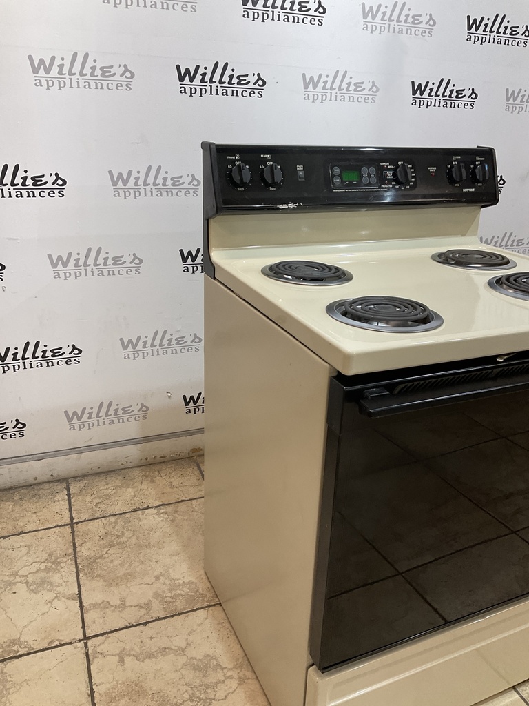 Ge Used Electric Stove 20volts (40/50 AMP) 30inches {no cord} (Bisque/Black) 