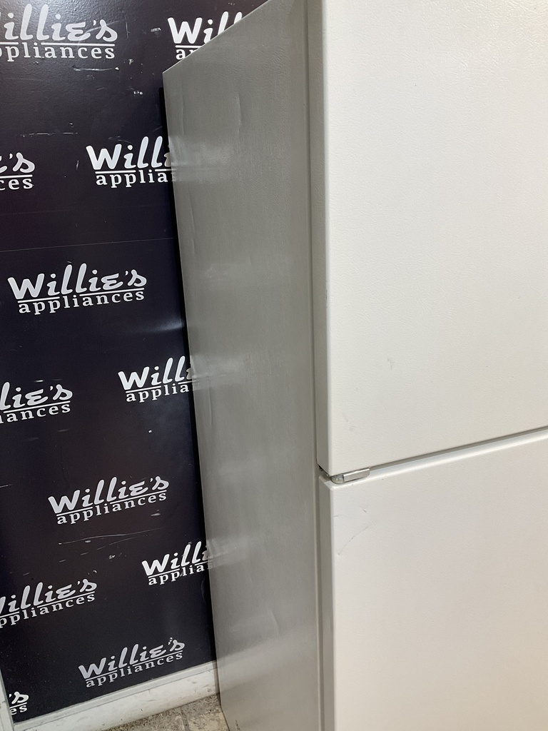 Whirlpool Used Refrigerator Top and Bottom 33x65 1/2” (White)