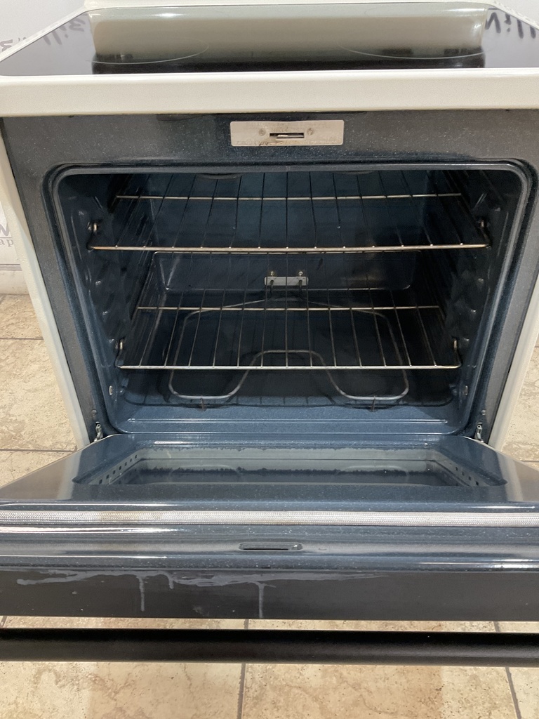 Ge Used Electric Stove 220volts (40/50 AMP) 30inches {3 prong} (Bisque/Black) 