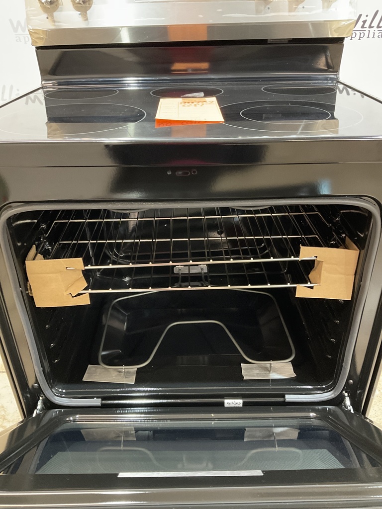 Ge New Open Box Electric Stove 220volts (40/50 AMP) 30inches {no cord} (Stainless steel) 