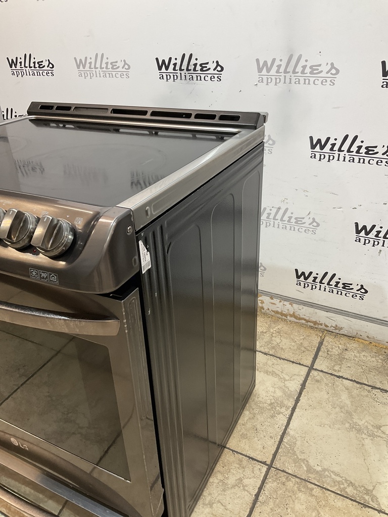 Lg Used Electric Stove 220volts (40/50 AMP) 30inches {no cord} (Stainless steel) 