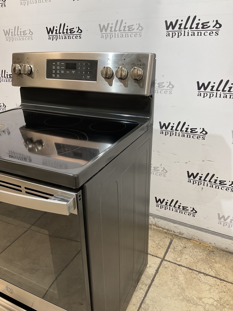 Ge Used Electric Stove 220volts (40/50 AMP) 30inches {3 prong} (Stainless steel) 