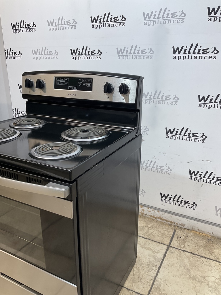 Amana Used Electric Stove 220volts (40/50 AMP) 30inches {4 prong} (Stainless steel) 