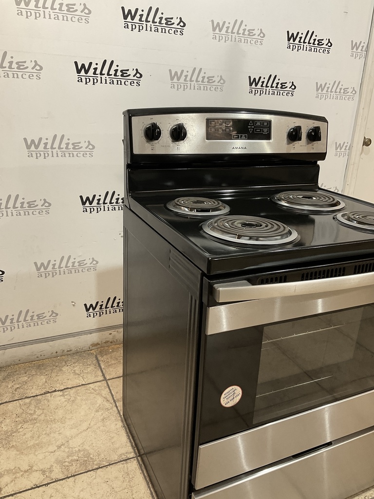 Amana Used Electric Stove 220volts (40/50 AMP) 30inches {4 prong} (Stainless steel) 