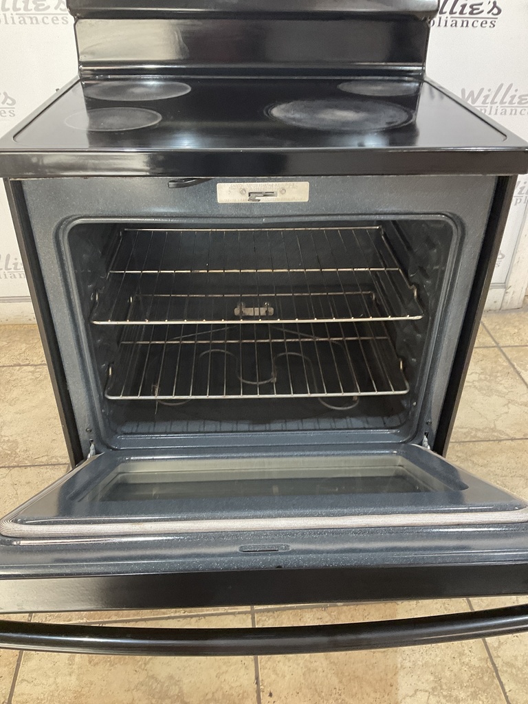 Ge Used Electric Stove 220volts (40/50 AMP) 30inches {4 prong} (Black) 