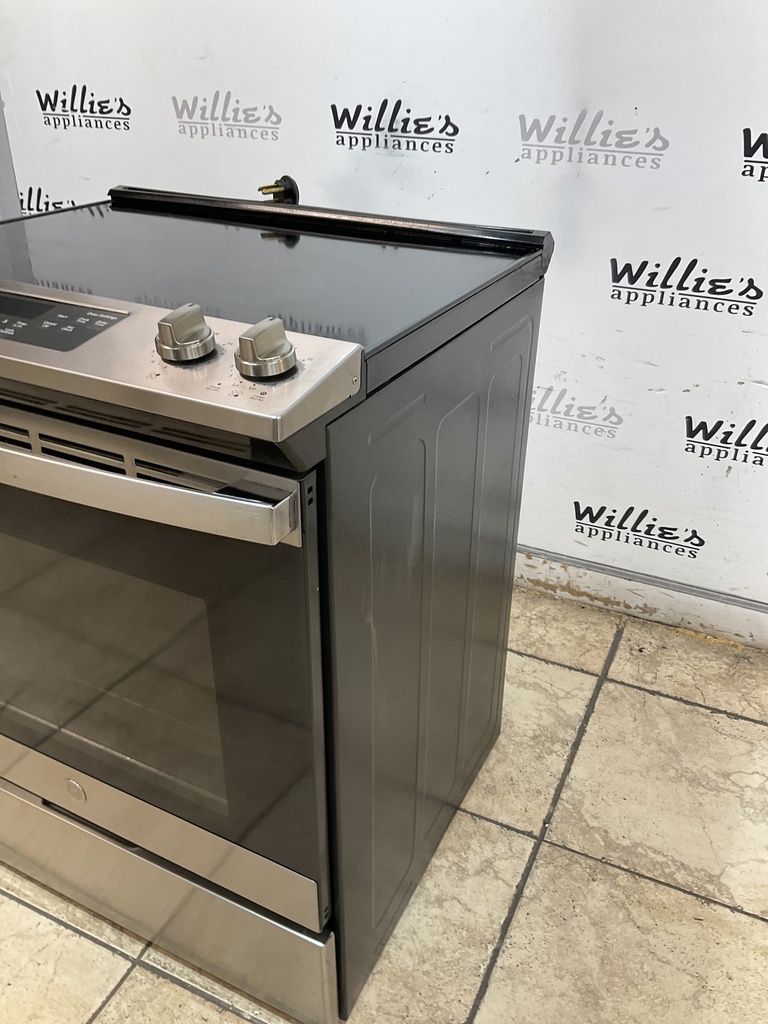 Ge Used Electric Stove 220volts (40/50 AMP) 30inches {4 prong} (Stainless steel)