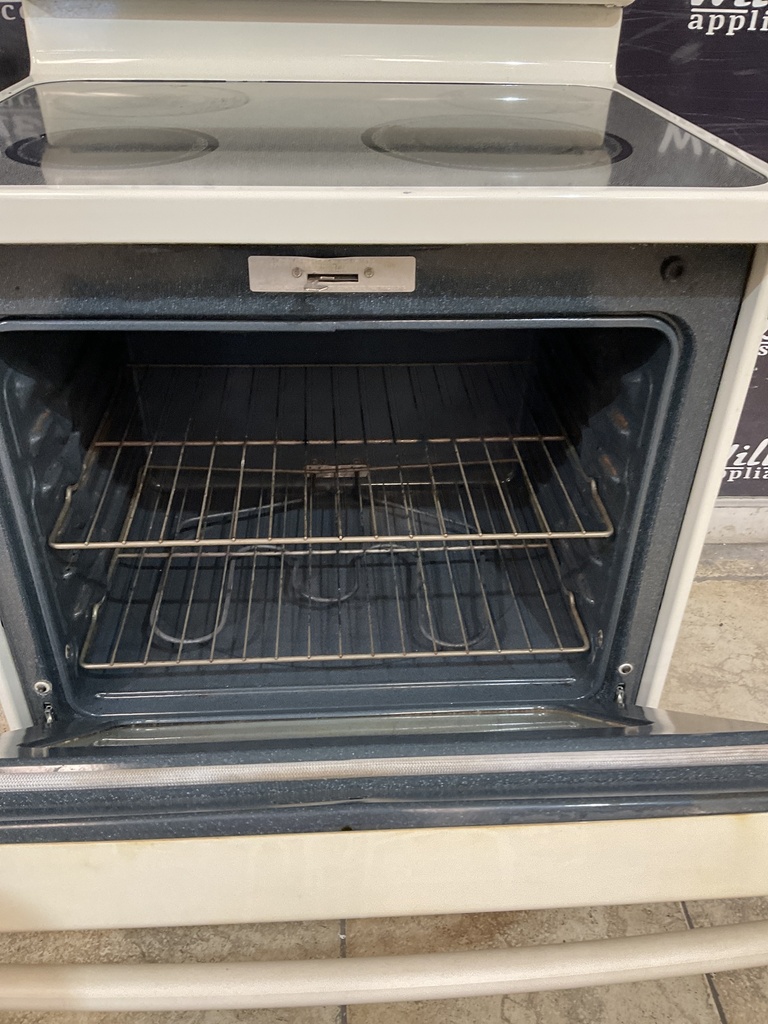 Ge Used Electric Stove 220 volts (40/50 AMP) 30inches {3 prong} (Bisque)