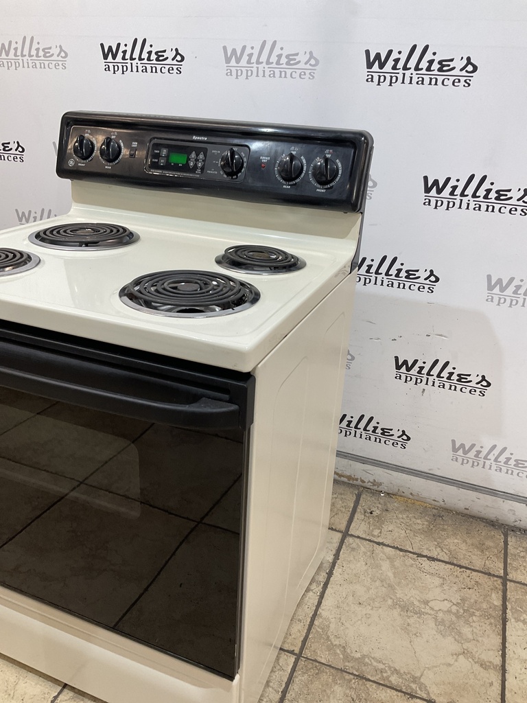 Ge Used Electric Stove 220volts (40/50 AMP) 30inches {no cord} (Bisque/Black) 