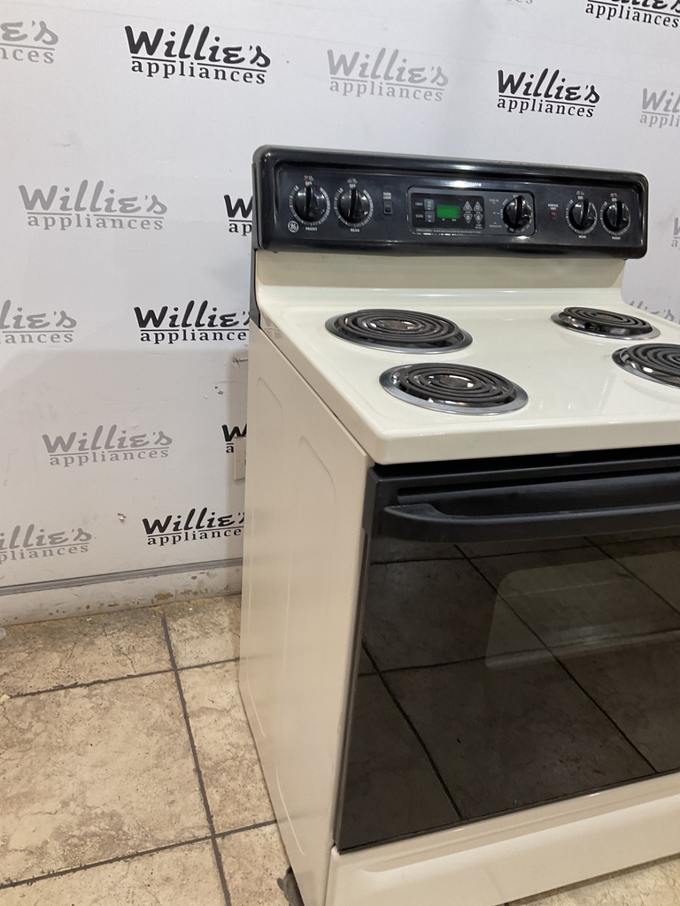 Ge Used Electric Stove 220volts (40/50 AMP) 30inches {no cord} (Bisque/Black) 