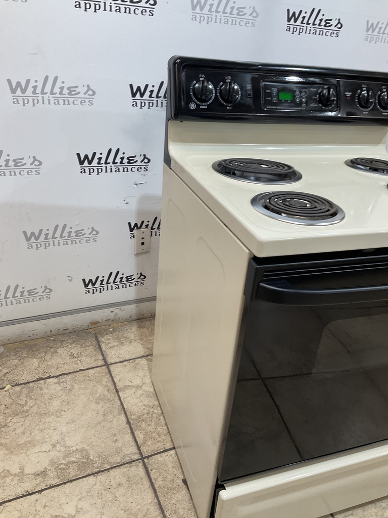Ge Used Electric Stove 2220volts (40/50 AMP) 30inches {no cord} (Bisque/Black) 