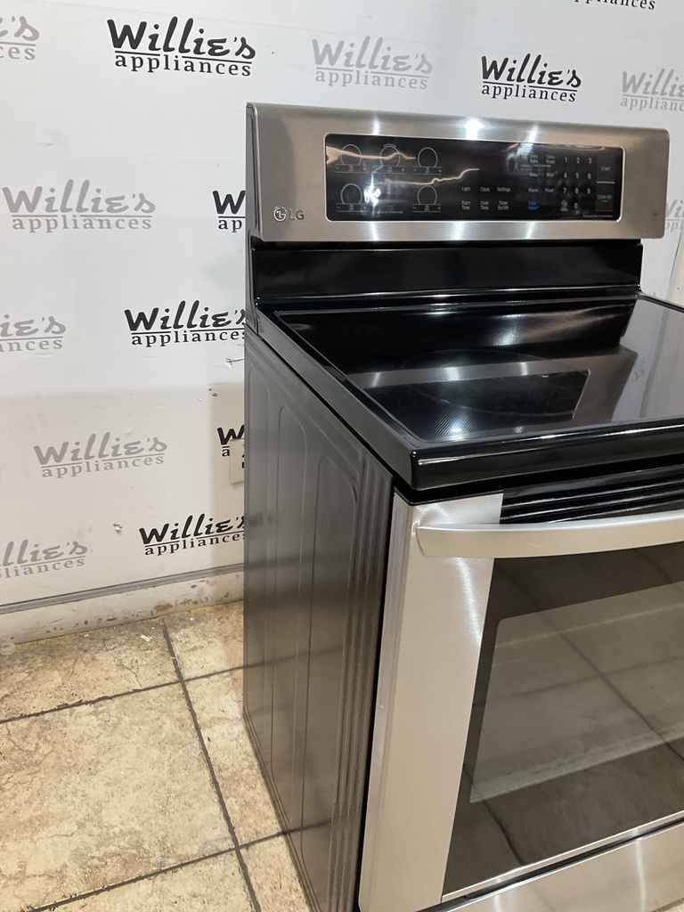 Lg Used Electric Stove 220volts (40/50 AMP) 30inches {4 prong} (Stainless Steel) 