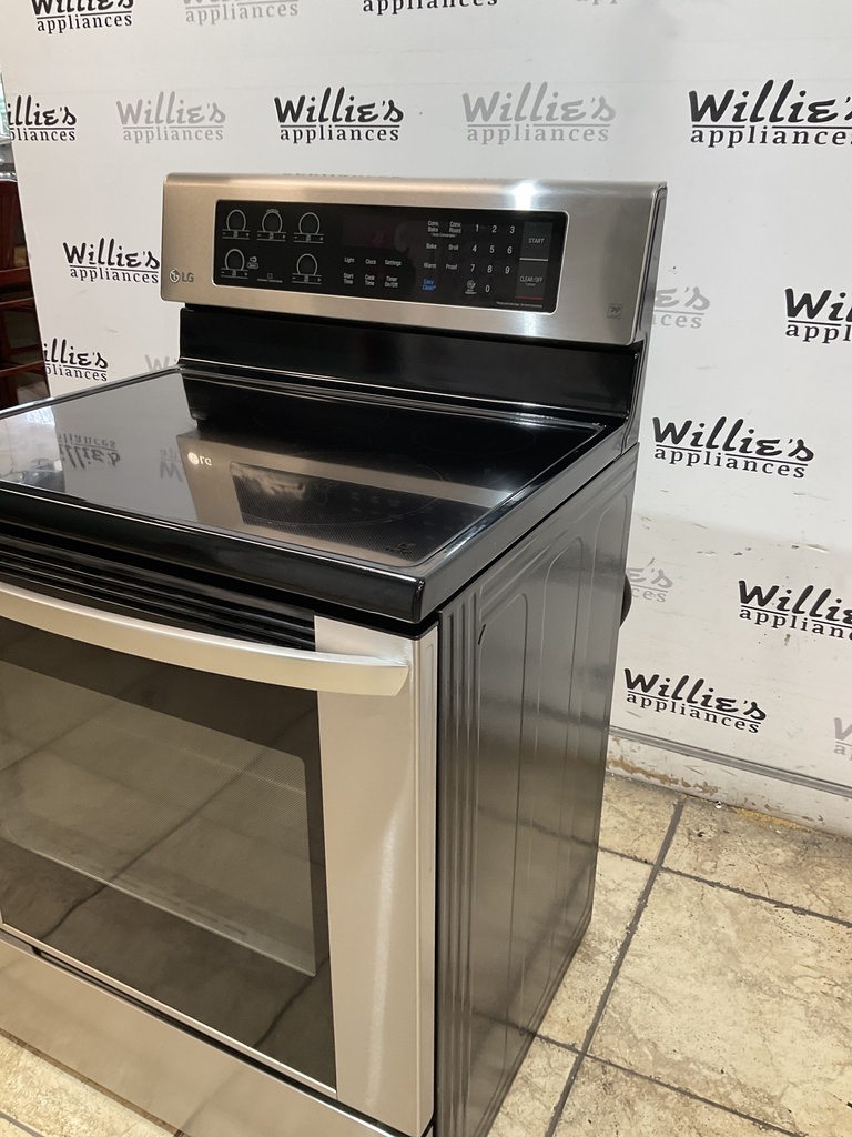Lg Used Electric Stove 220volts (40/50 AMP) 30inches {4 prong} (Stainless Steel) 