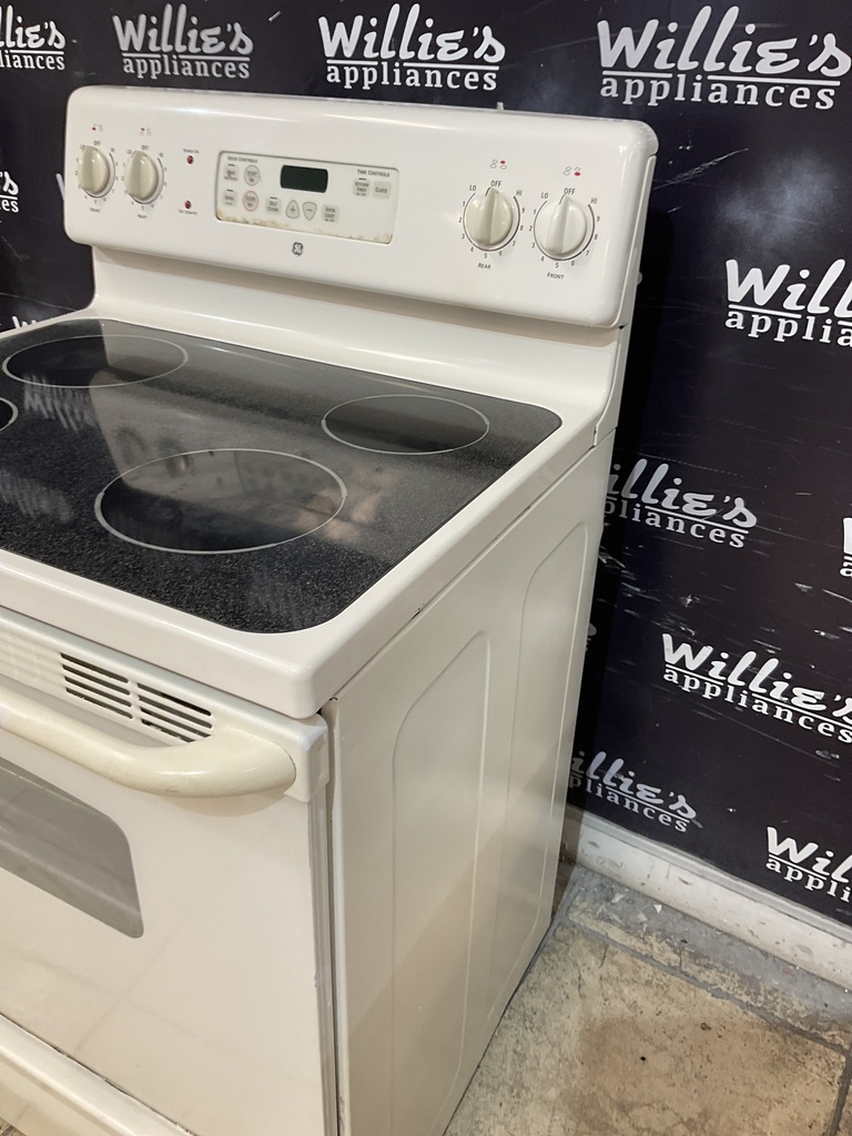 Ge Used Electric Stove 220volts (40/50 AMP)  30inches {3 prong} (Bisque) 