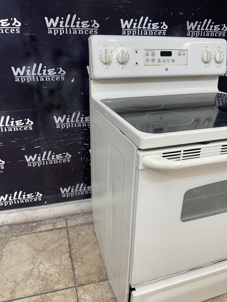 Ge Used Electric Stove 220volts (40/50 AMP)  30inches {3 prong} (Bisque) 