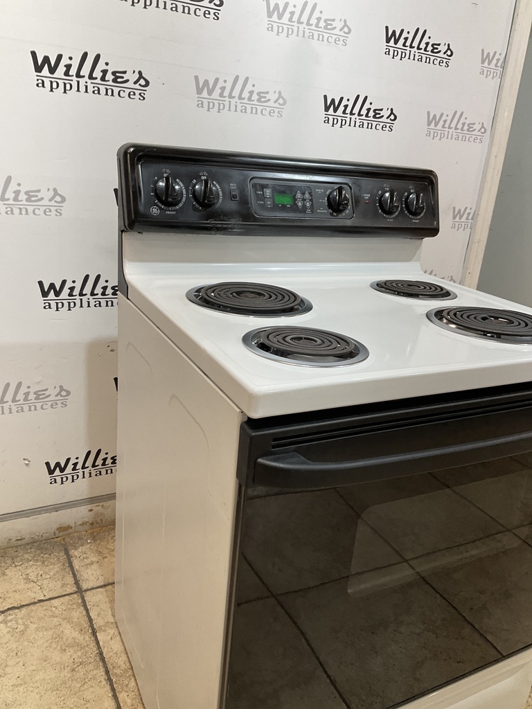 Ge Used Electric Stove 220volts (40/50 AMP) 30inches {3 prong} (White/black) 