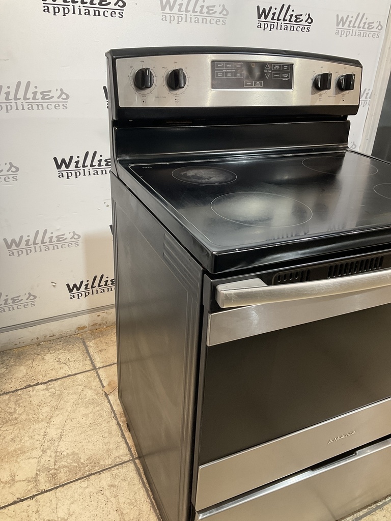 Amana Used Electric Stove 220volts (40/50 AMP) 30inches {no cord} (Stainless steel) 
