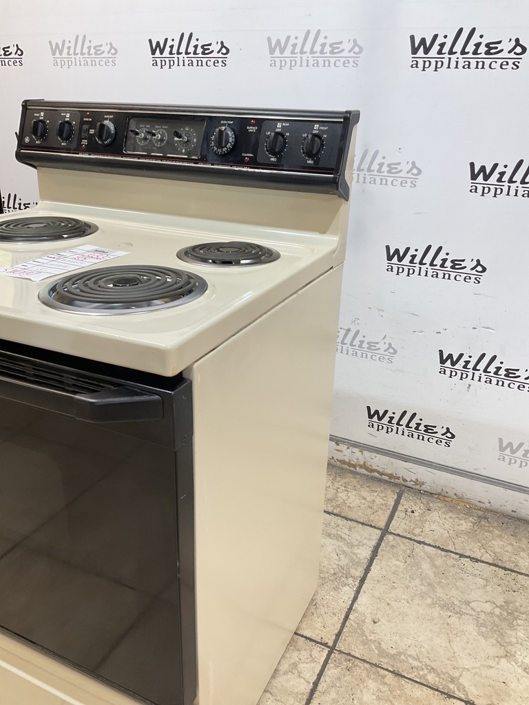 Ge Used Electric Stove 220volts (40/50 AMP)  30inches {3 prong} (Bisque/Black)