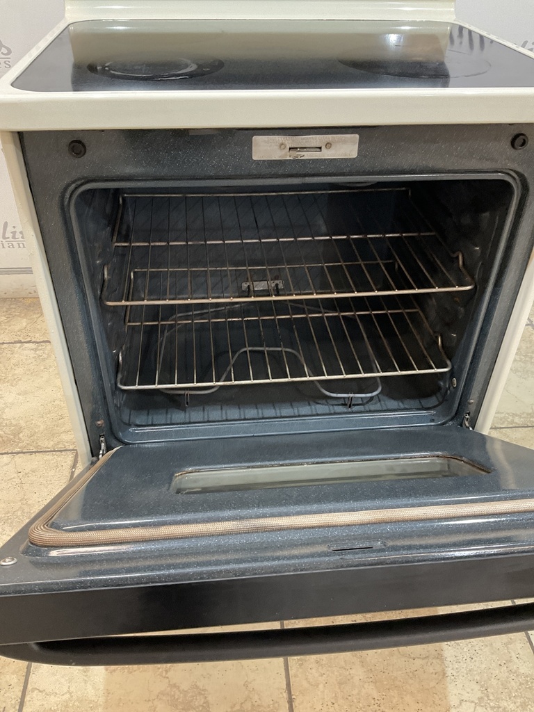 Ge Used Electric Stove 220volts (40/50 AMP) 30inches {3 prong} (Bisque/black) 
