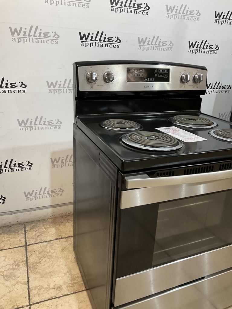 Amana Used Electric Stove 220volts (40/50 AMP) 30inches {no cord} (Stainless steel) 