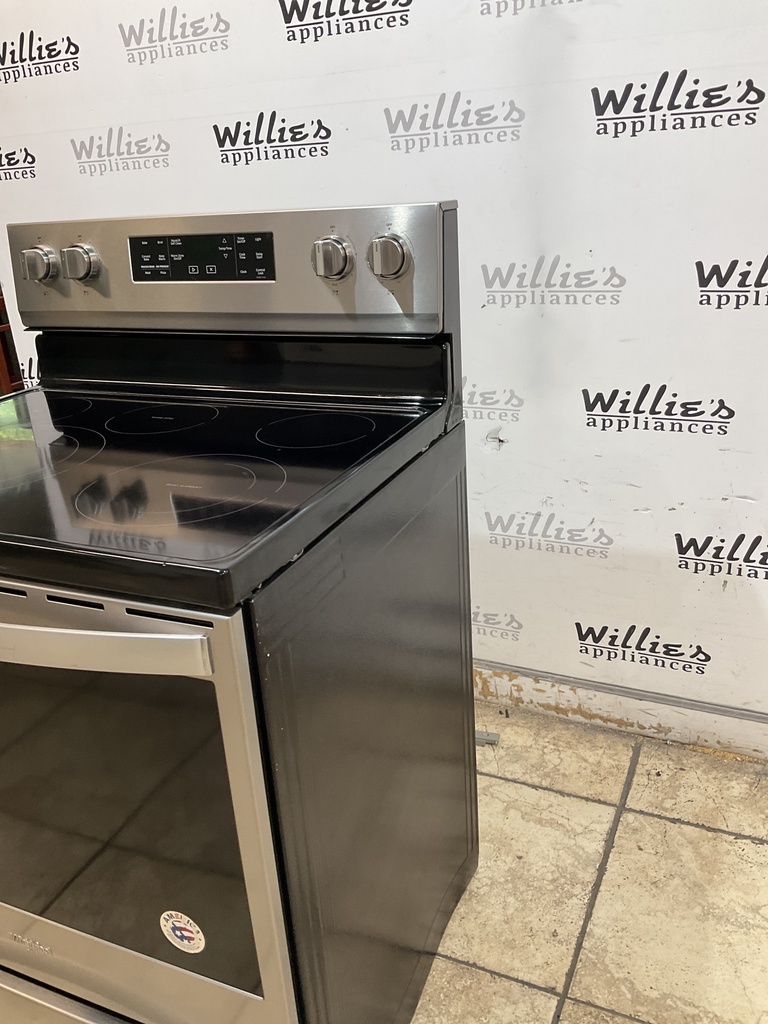 Whirlpool Used Electric Stove 220volts (40/50 AMP) 30inches {4 prong} (Stainless steel) 