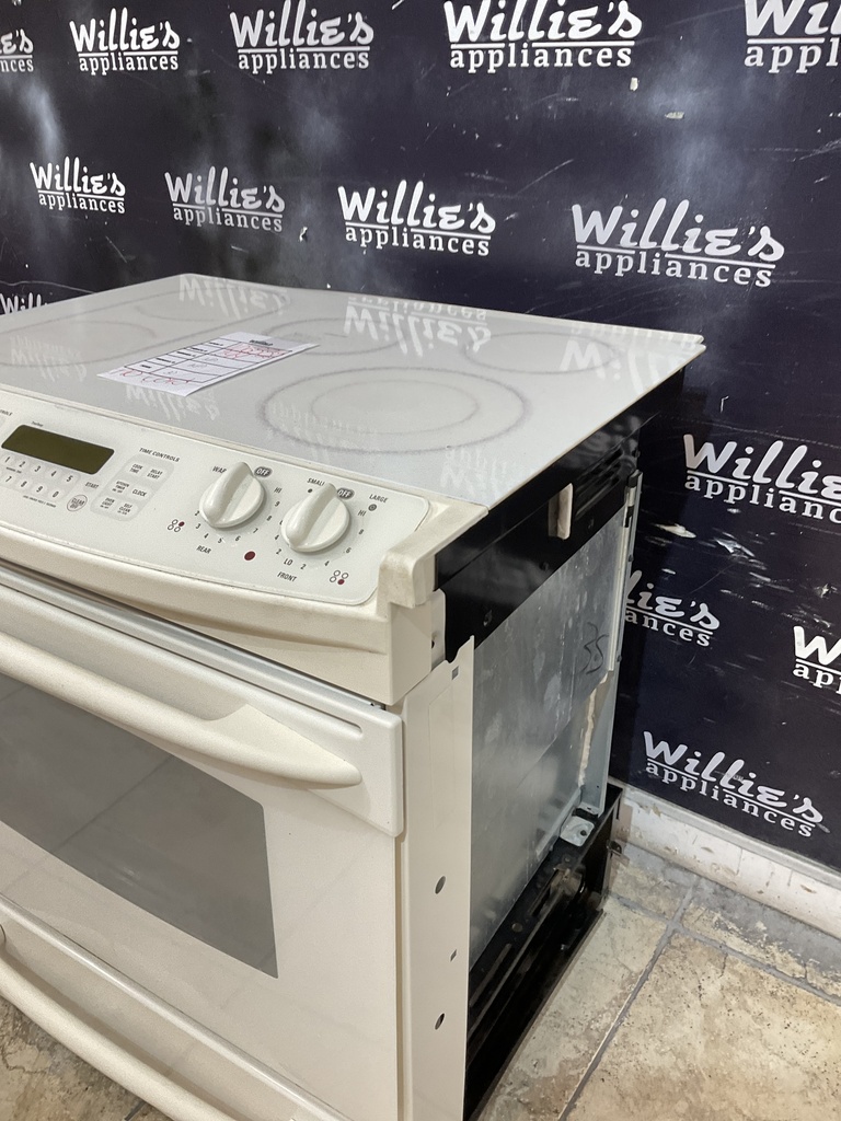 Ge Used Electric Stove 220volts (40/50 AMP)  30inches {no cord} (bisque’) 
