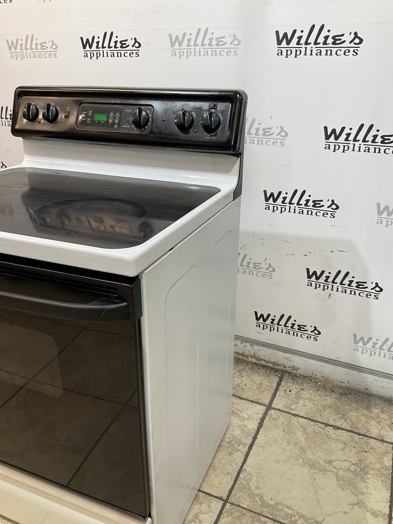 Ge Used Electric Stove 220volts (40/50 AMP) 30inches {3 prong} (White/Black) 