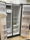 Ge Used Refrigerator Side by Side 32x66 1/2”