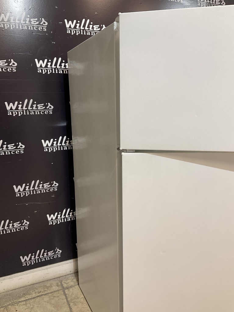 Hotpoint Used Refrigerator Top and Bottom 28x61 1/2” 
