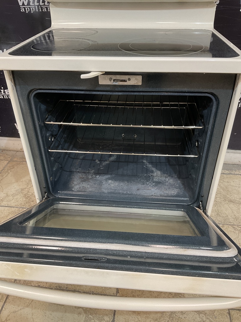 Ge Used Electric Stove 220volts (40/50 AMP) 30inches {4 prong} (Bisque)