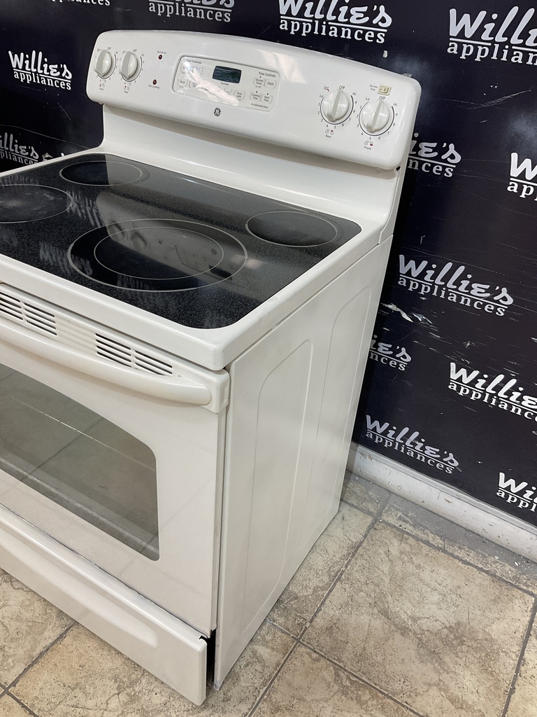 Ge Used Electric Stove 220volts (40/50 AMP) 30inches {4 prong} (Bisque)