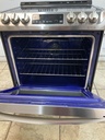 Lg Used Electric Stove 220volts (40/50 AMP) 30inches {4 prong} (Stainless Steel)