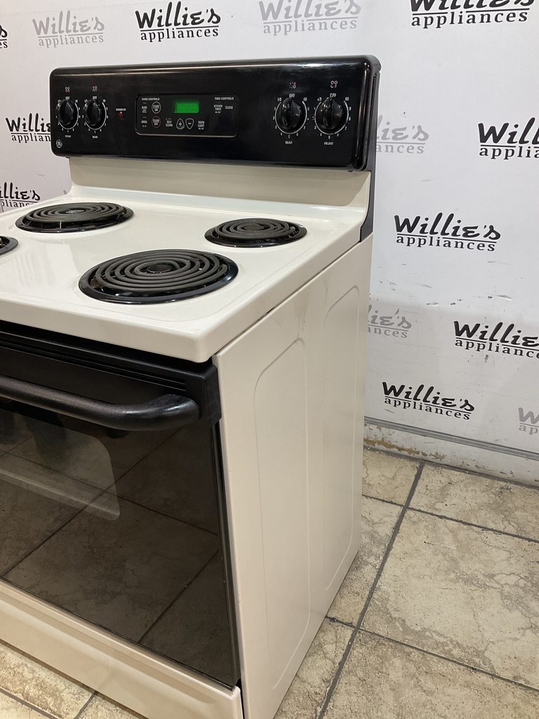 Ge Used Electric Stove 220volts (40/50 AMP) 30inches {3 prong} (Bisque/Black)