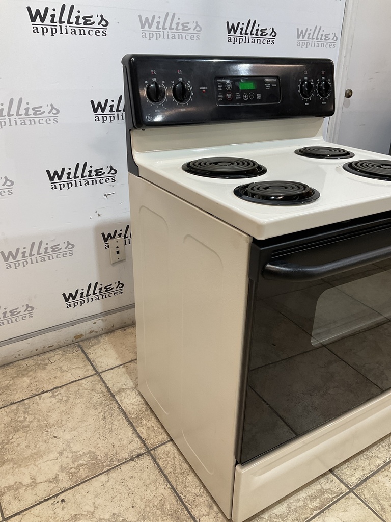 Ge Used Electric Stove 220volts (40/50 AMP) 30inches {3 prong} (Bisque/Black)