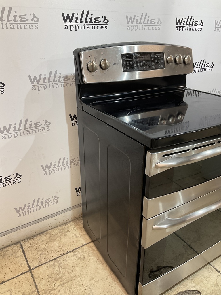 Ge Used Electric Stove 220volts (40/50 AMP) 30inches {4 prong} (Stainless Steel) 