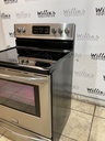 Frigidaire Used Electric Stove 220volts (40/50 AMP) 30inches {4 prong} (Stainless steel)