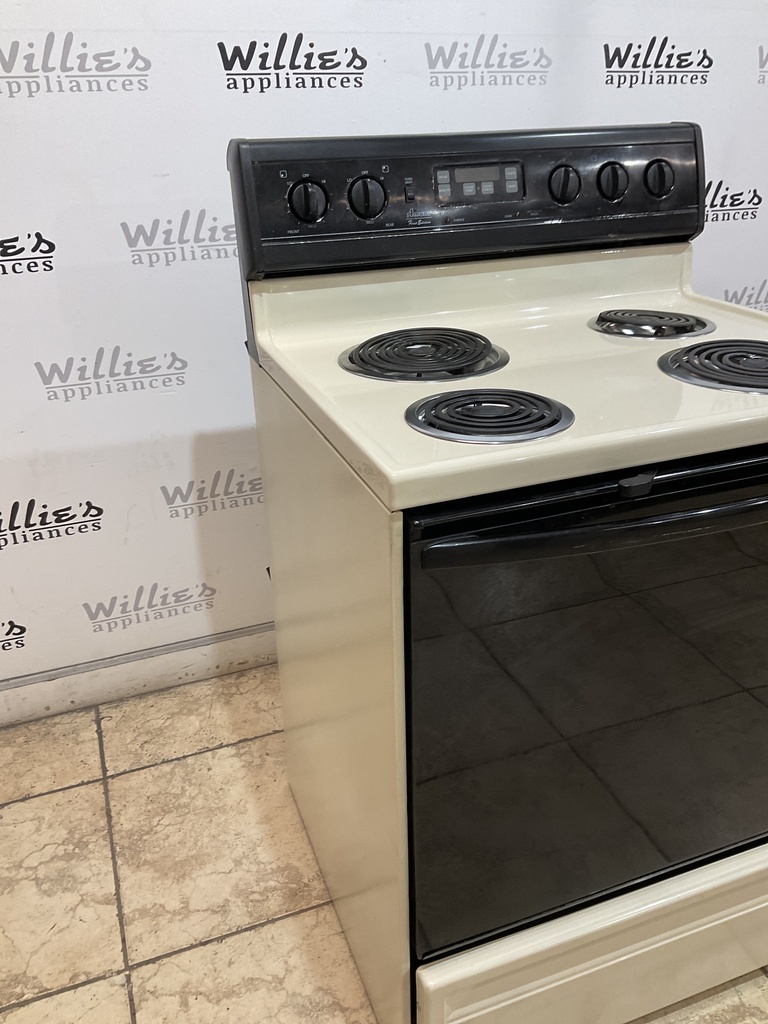 Amana Used Electric Stove 220volts (40/50 AMP) 30inches {4 prong} (Bisque/Balck)