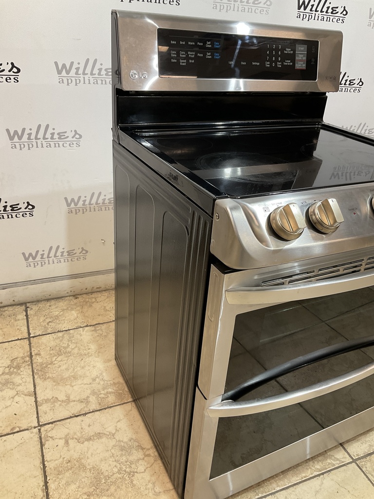 Lg Used Electric Stove 220volts (40/50 AMP) 30inches {3 prong} (Stainless Steel)