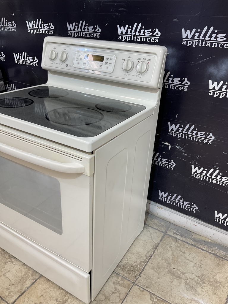 Ge Used Electric Stove 220volts(40/50 AMP) 30inches {3 prong} (Bisque) 