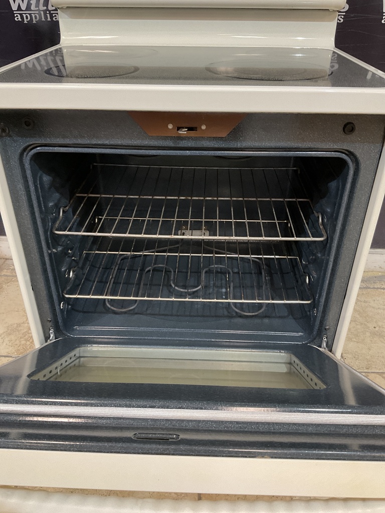 Ge Used Electric Stove 220volts(40/50 AMP) 30inches {3 prong} (Bisque) 