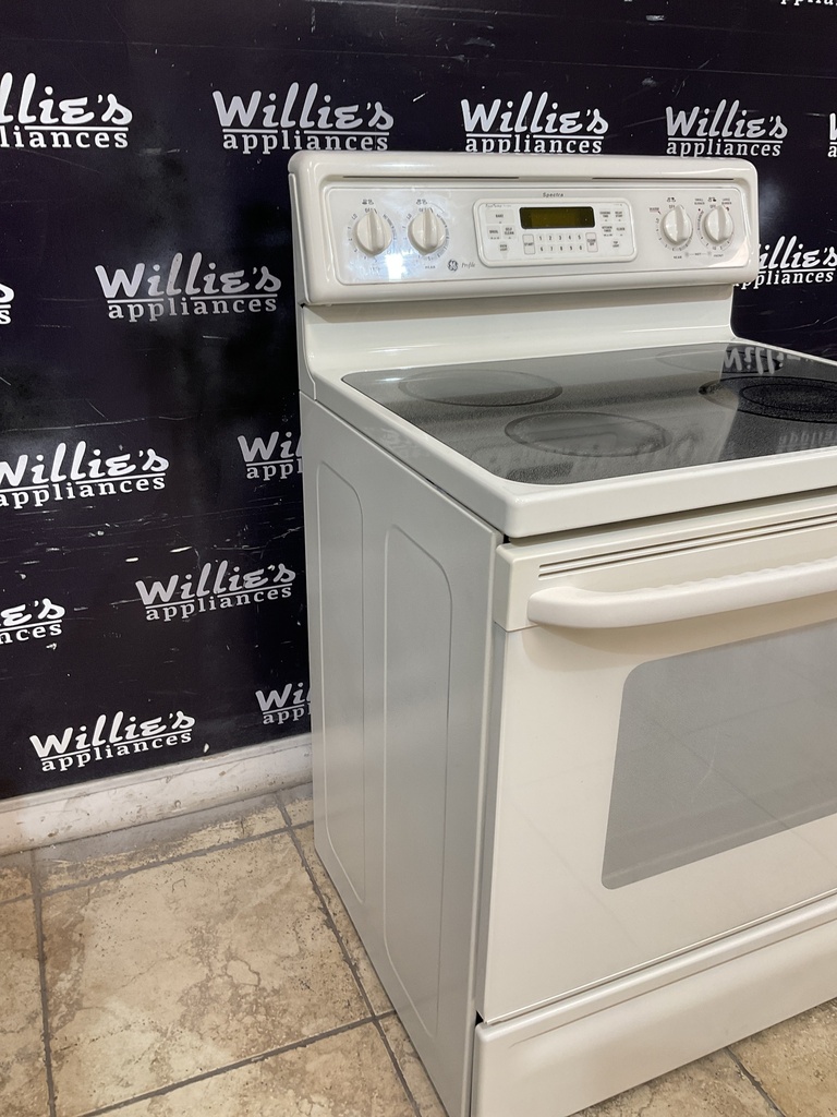 Ge Used Electric Stove 220volts(40/50 AMP) 30inches {3 prong} (Bisque) 