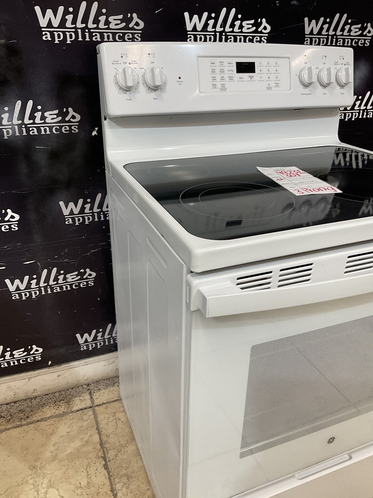 Ge Used Electric Stove 220volts (40/50 AMP) 30inches {3 prong} (white) 