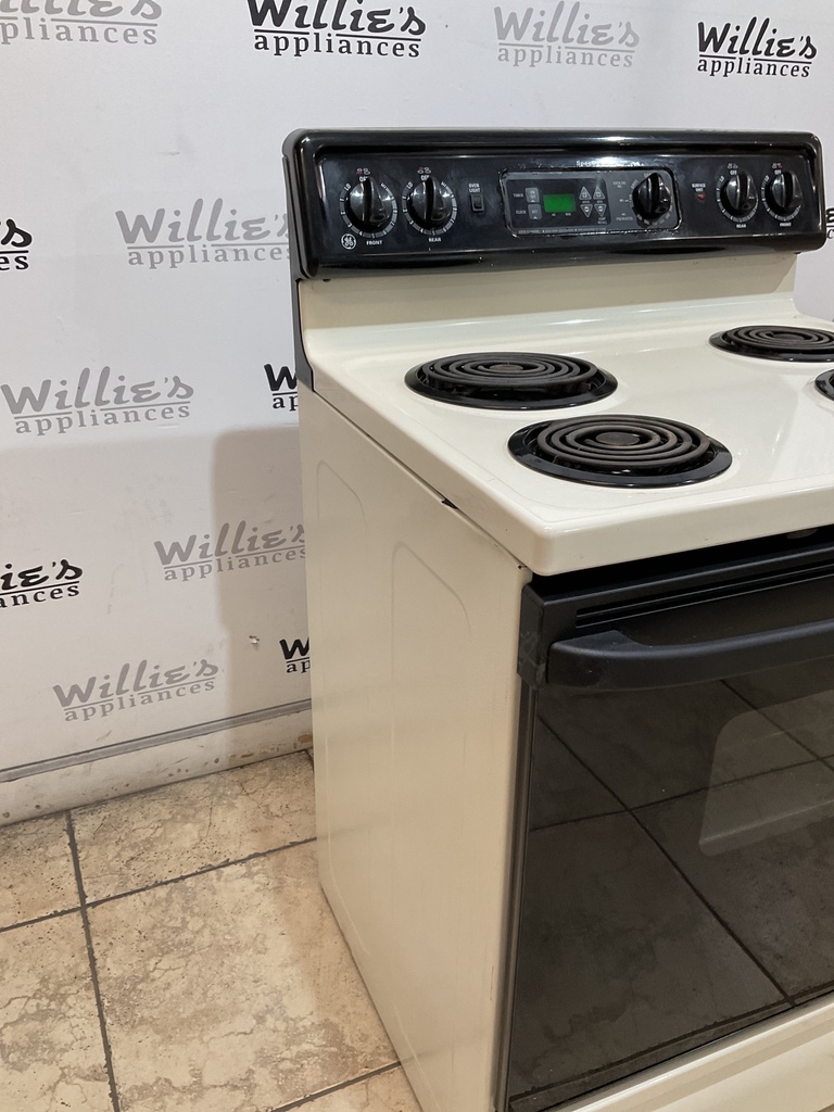 Ge Used Electric Stove 220volts (40/50 AMP) 30inches {no cord} (Bisque/Black) 