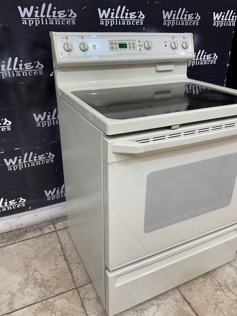 Ge Used Electric Stove 220volts (40/50 AMP) 30inches {4 prong} (Bisque) 