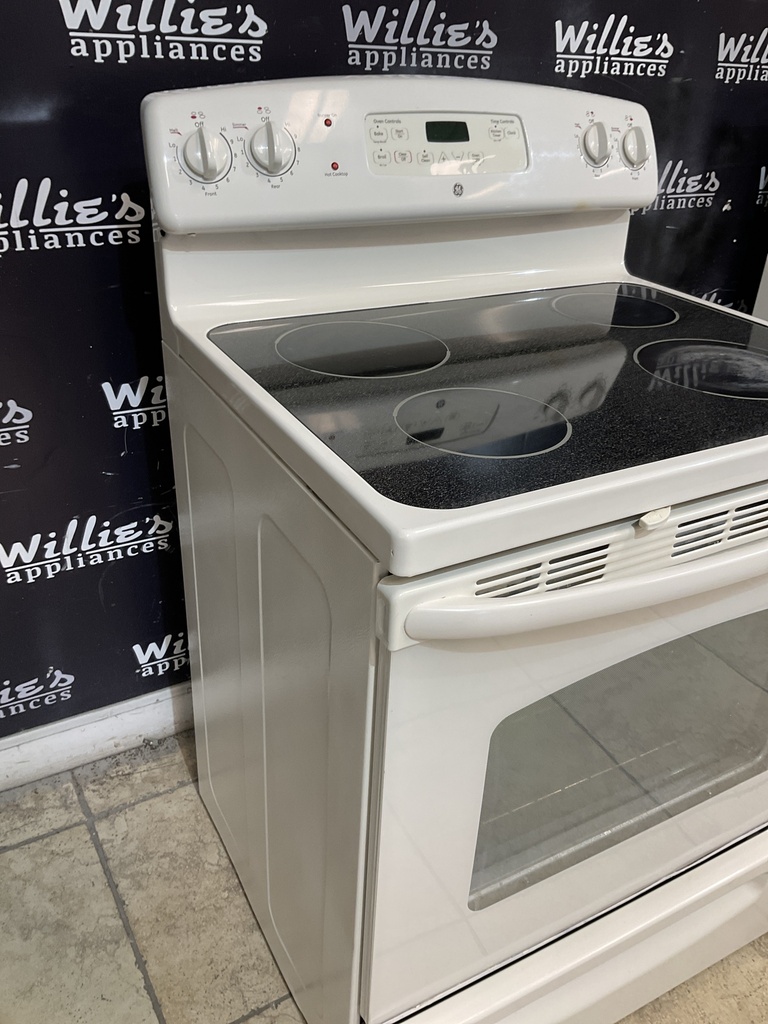 Ge Used Electric Stove 220volts (40/50 AMP) 30inches {4 prong} (Bisque) 