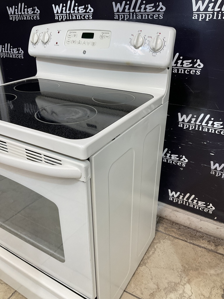 Ge Used Electric Stove 220volts (40/50 AMP) 30inches {4 prong} (Bisque) 