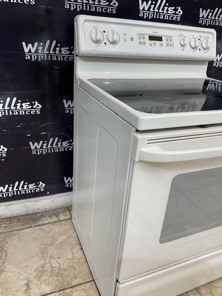 Ge Used Electric Stove 220volts (40/50 AMP) 30inches {3 prong} (Bisque ) 