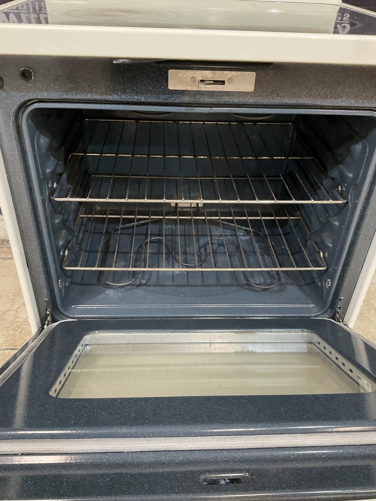 Ge Used Electric Stove 220volts (40/50 AMP) 30inches {3 prong} (Bisque ) 